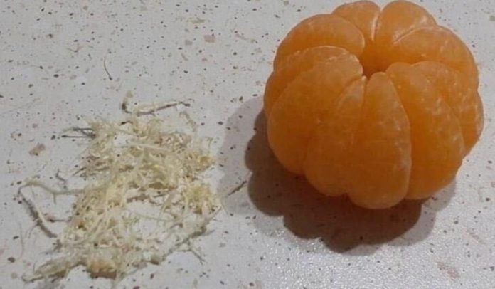 Як праильно почистити мандарин