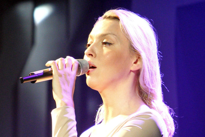 Оля Полякова