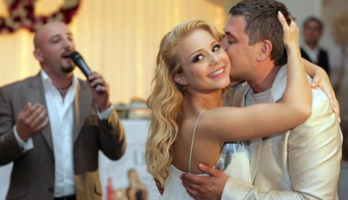 Тіна Кароль та Євген Огір