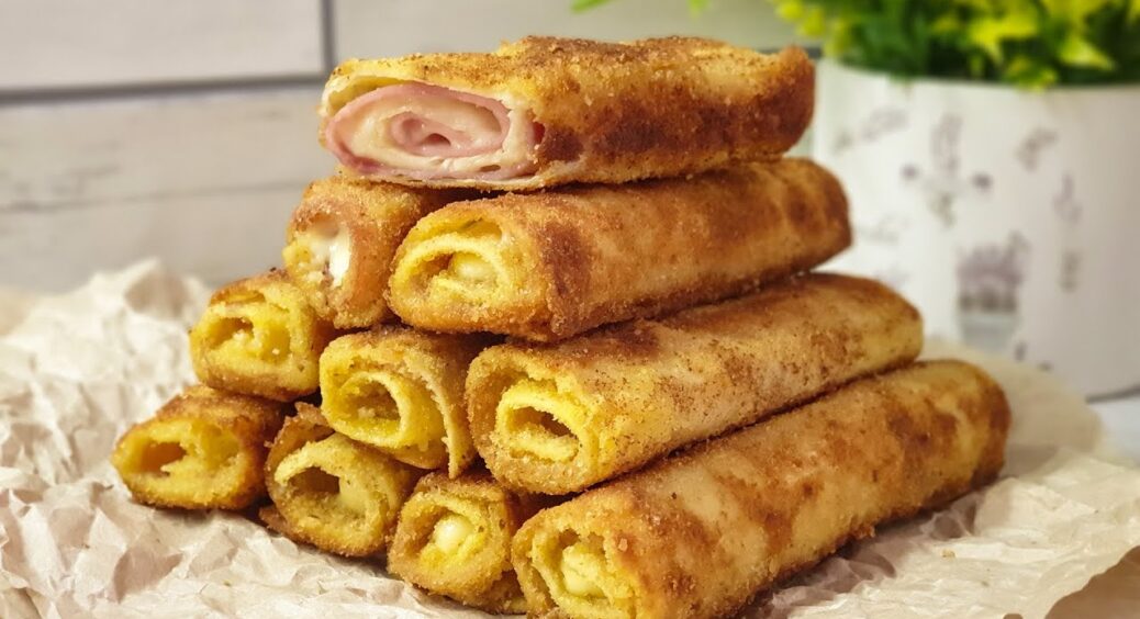 Рецепт неймовірно ніжної та ситної закуски: часникові трубочки з сиром за 10 хвилин до святкового застілля 