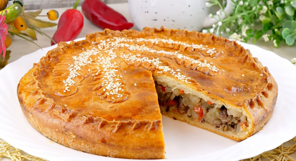 Один раз спробуєте й будете готувати постійно: рецепт м’ясного пирога, що вразить своєю простотою та смаком 