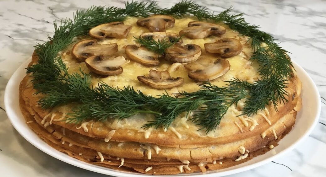 Тепер від вас не відчепляться, поки ви його не приготуєте: рецепт млинцевого пирога з куркою і сиром 