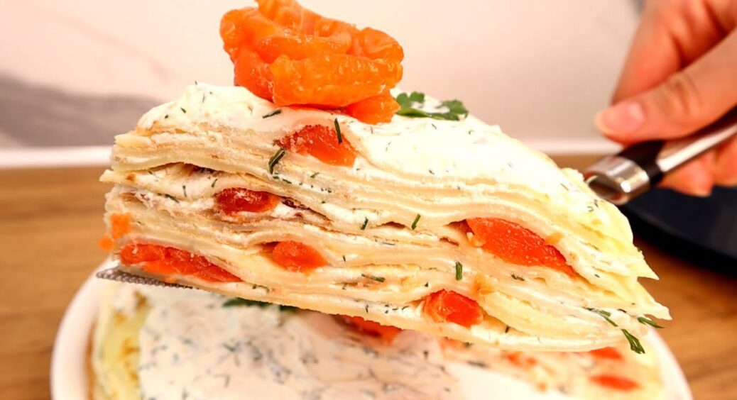 Який він смачний, ви просто не уявляєте: торт з млинців із червоною рибою на Новий рік 2025 