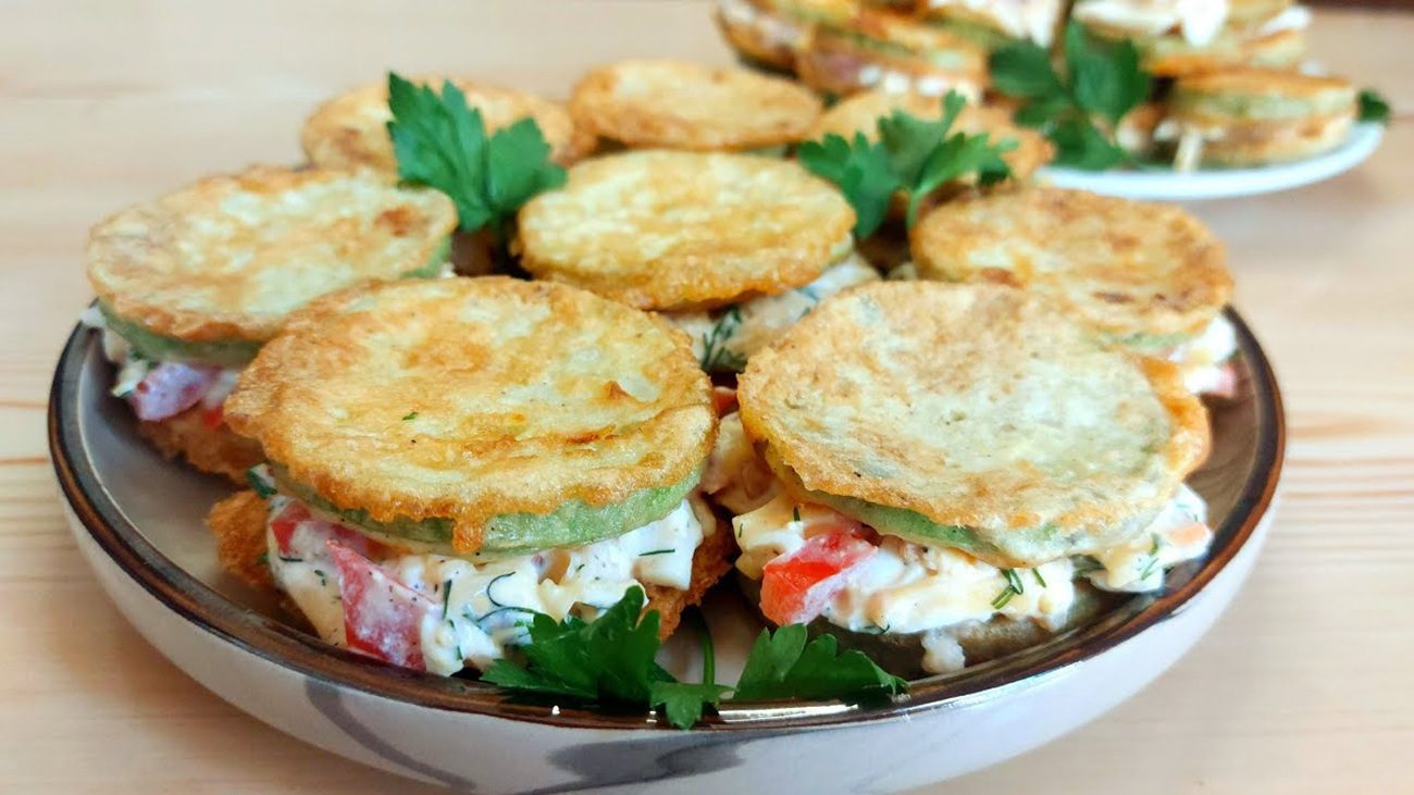 Рецепт смачних закусочних кабачків з сирною начинкою