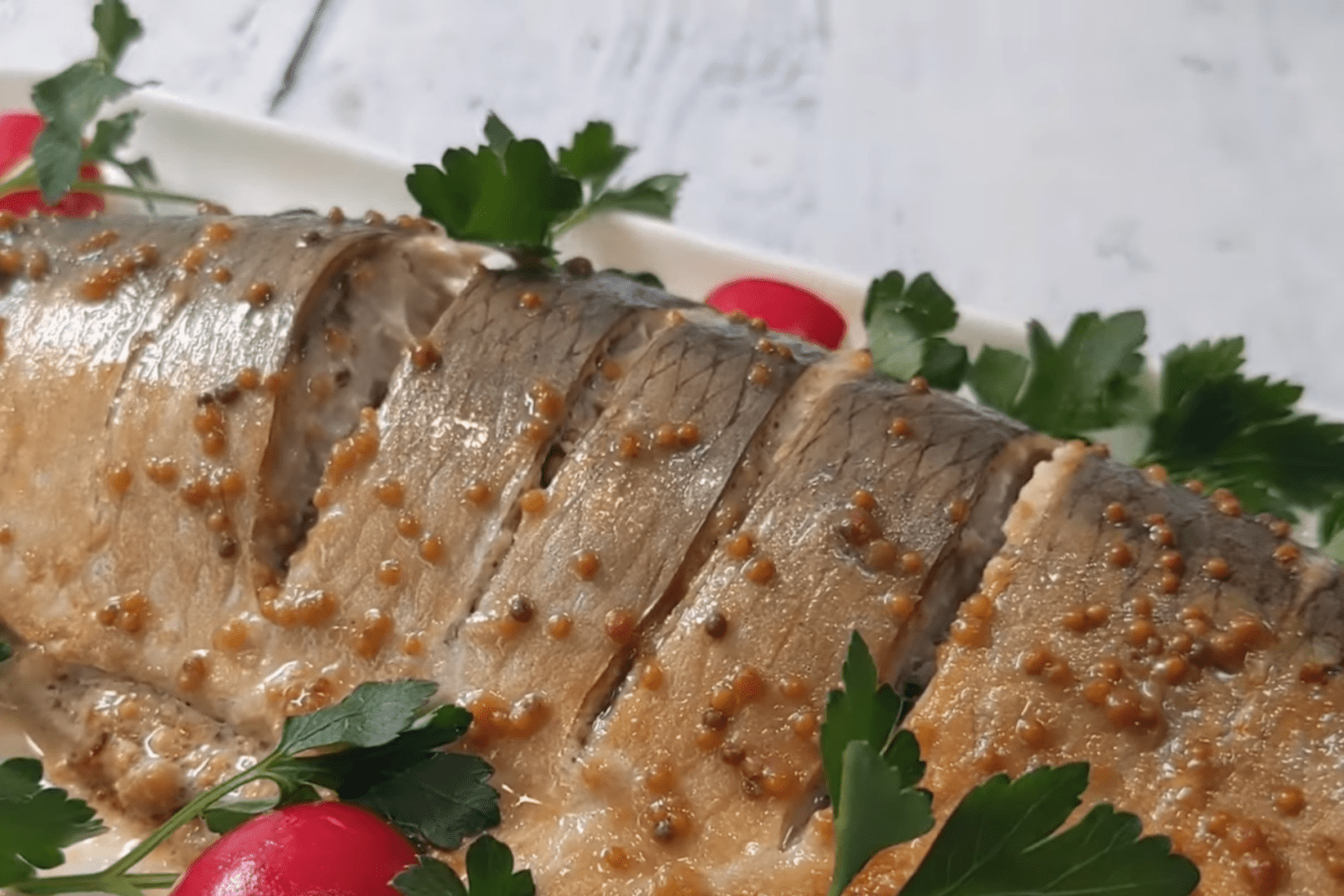 Кулінари розсекретили рецепт запеченого оселедця на святковий стіл. Фото з YouTube-каналу @navkus2848 Кулінари розсекретили рецепт запеченого оселедця на святковий стіл. Фото з YouTube-каналу @navkus2848